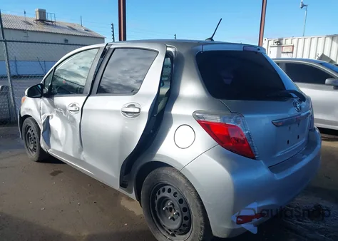 2012 Toyota Yaris Le z USA, uszkodzony, nr VIN JTDKTUD39CD523879